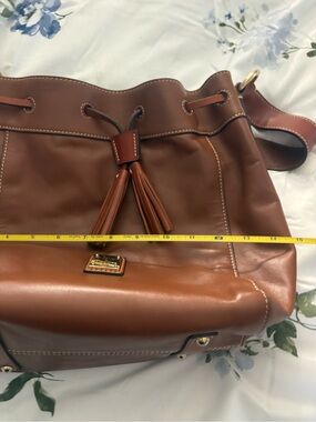 Dooney & Bourke Brown Leather Tassel Drawstring Shoulder Bag